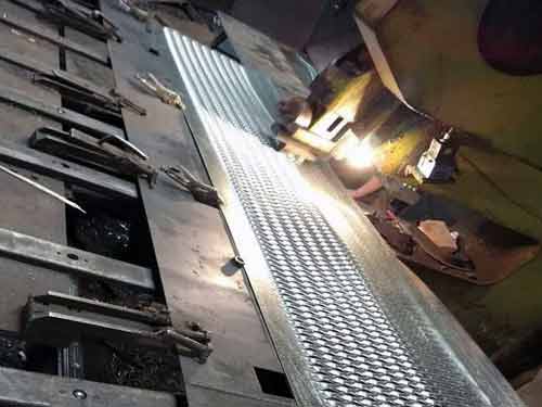 Grip Strut Panel Punching Process